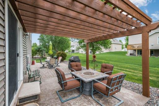 Spring Photo of the yard! Has extended paver patio with concrete patio!