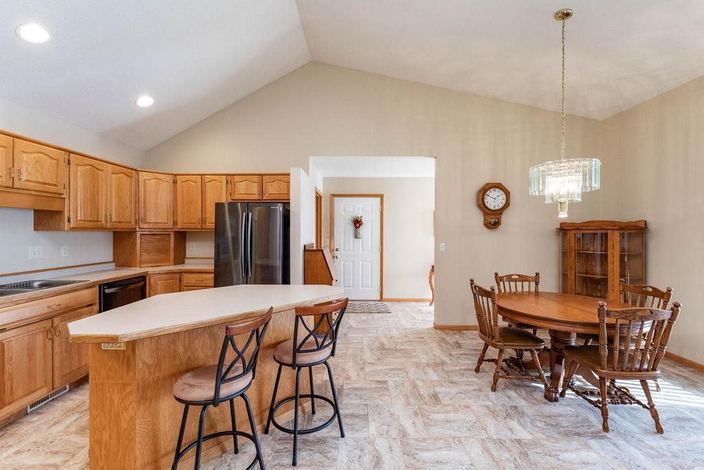 Kitchen & Dining to Garage entry & Front foyer hallway