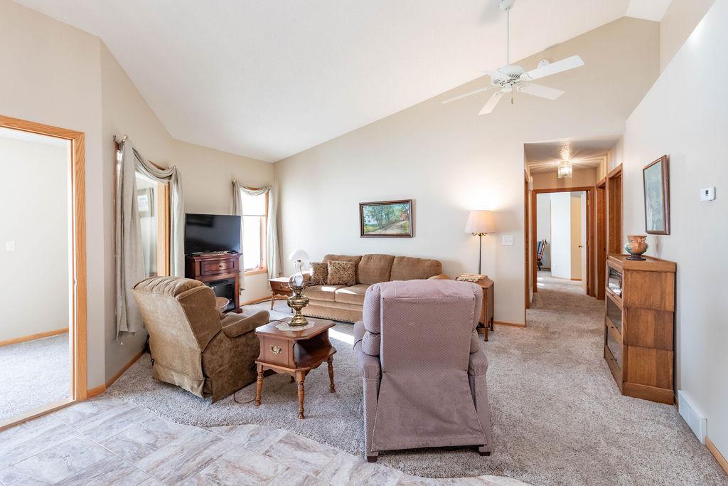 Living Room w/ vaulted ceilings