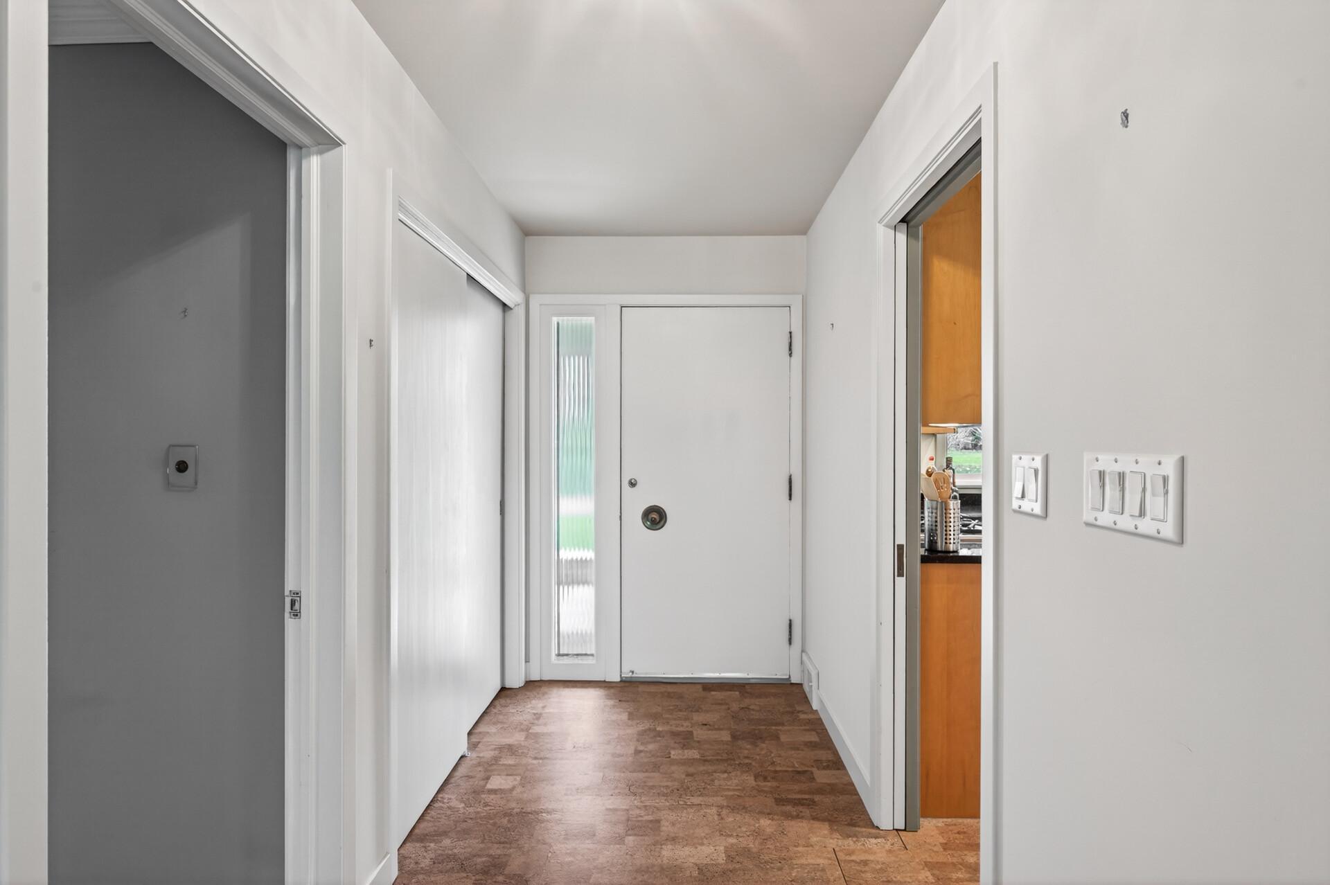 Entry with large closet and newer cork flooring
