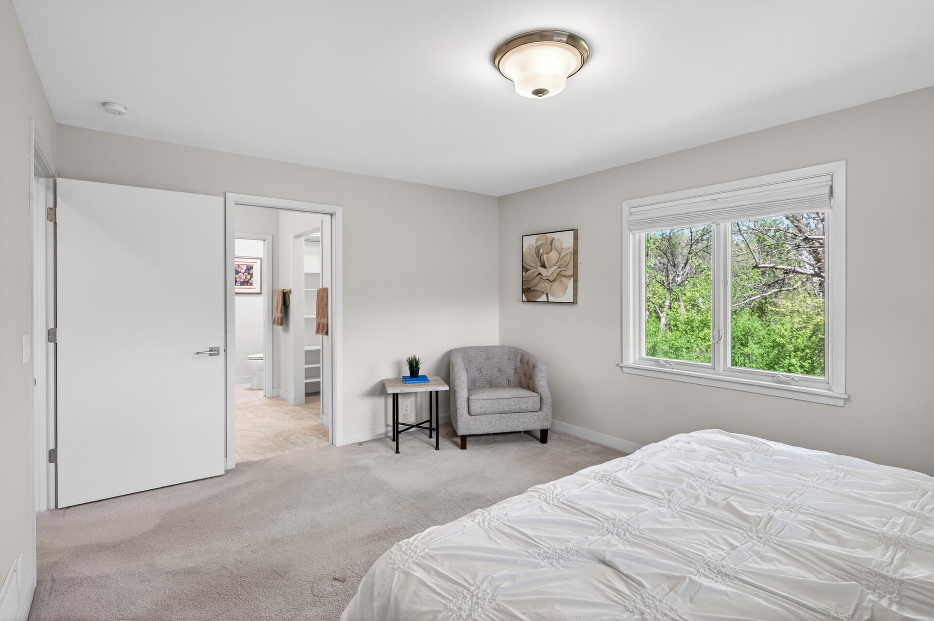 Primary bedroom has a private bath & walk-in closet