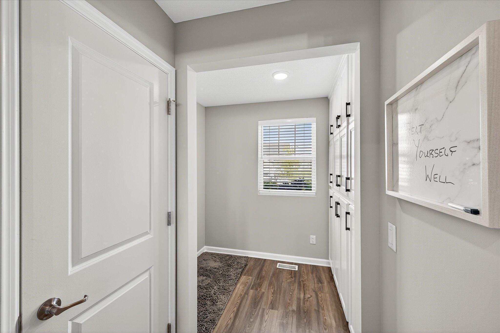 Additional cabintry added in the butler's area