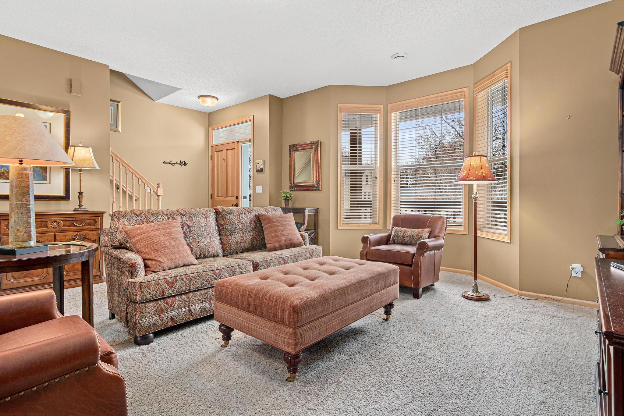 This impeccably maintained townhome is 100% turn-key and has been tastefully updated. The west facing front porch and bay window are perfect for observing beautiful sunsets.