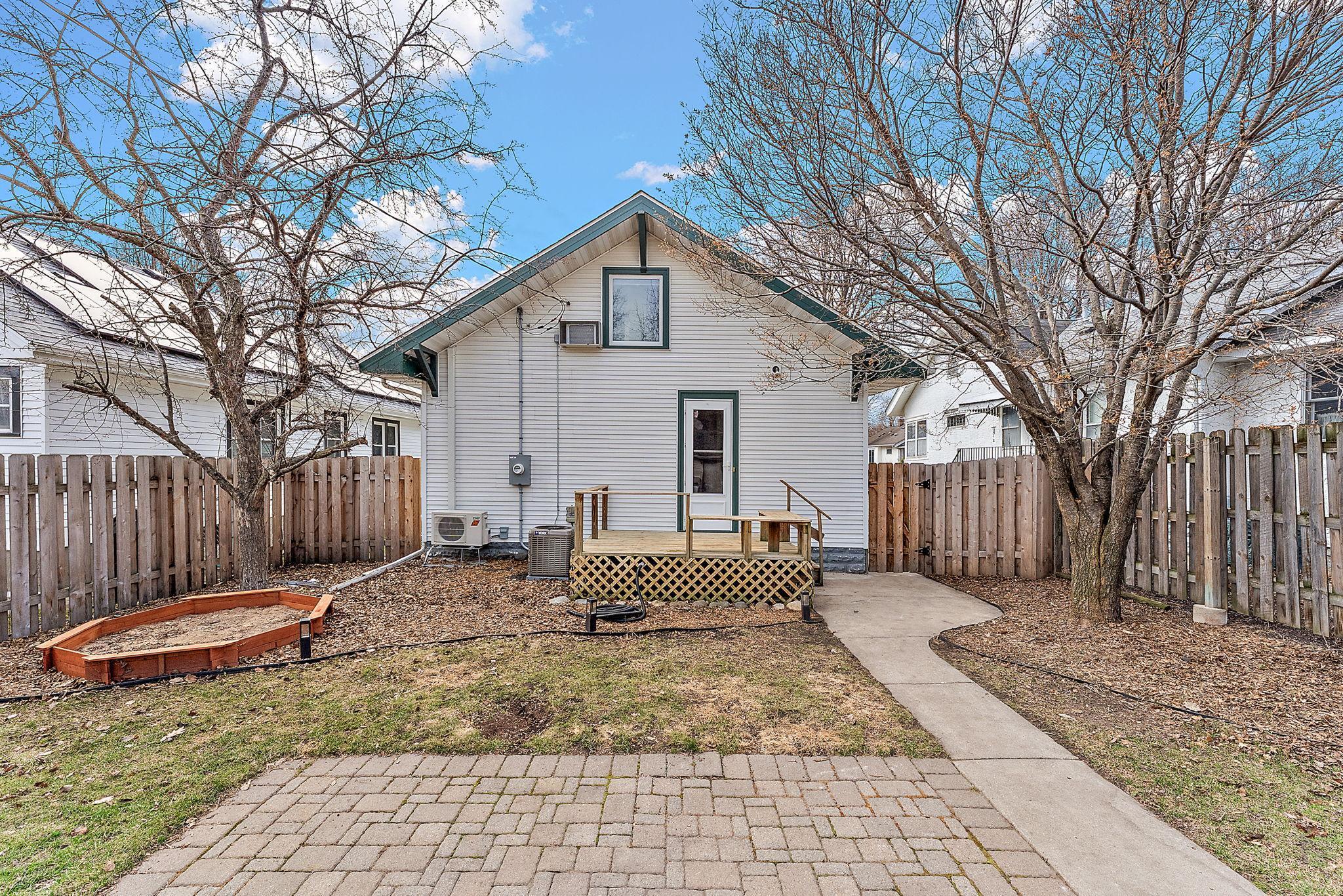 Relax in the shade on the deck off the back door.