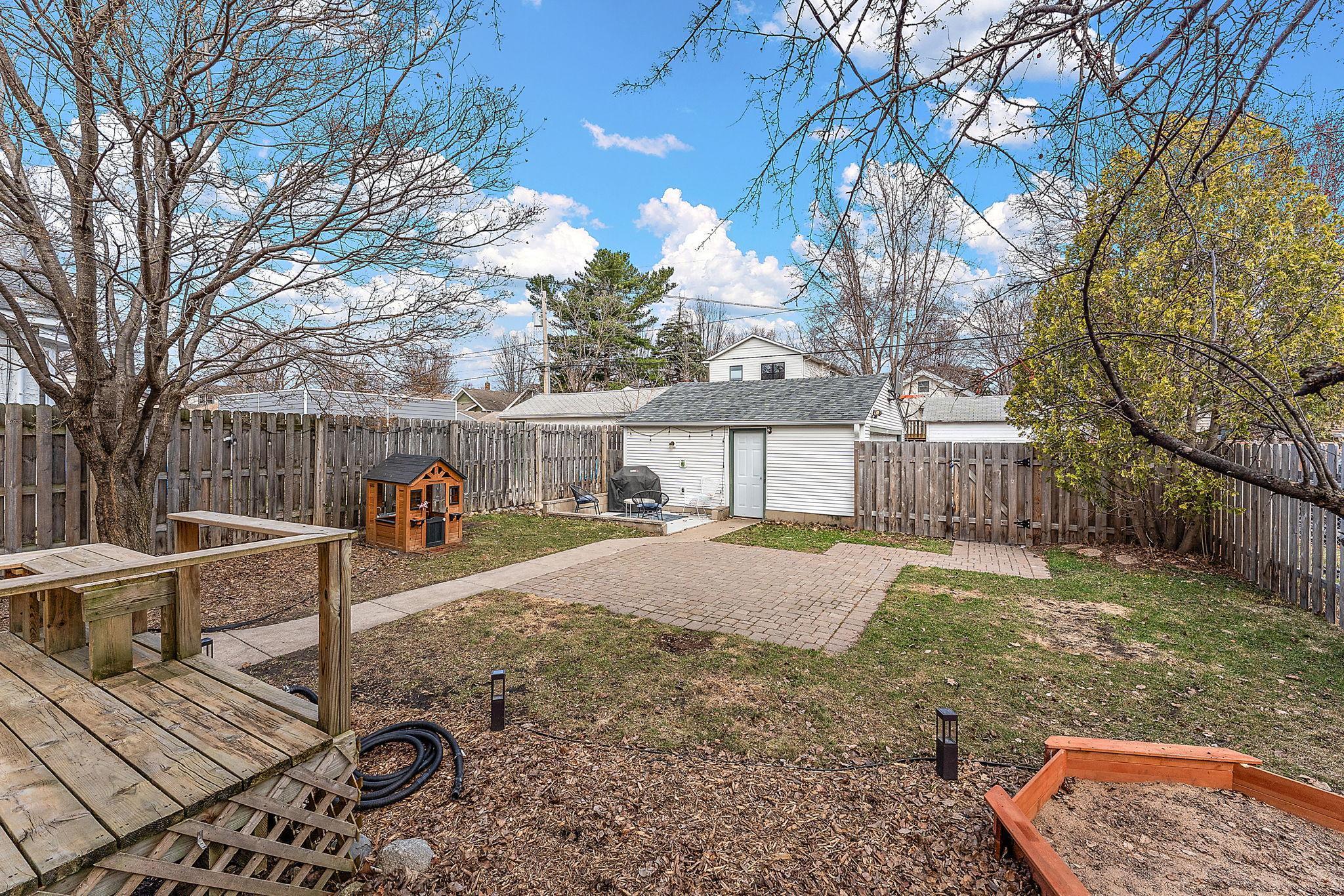 With two patio areas and green space, you’ll be set for grilling with pals, lawn games, or playing fetch with your pup in the fully-fenced yard. Fence new in 2023.