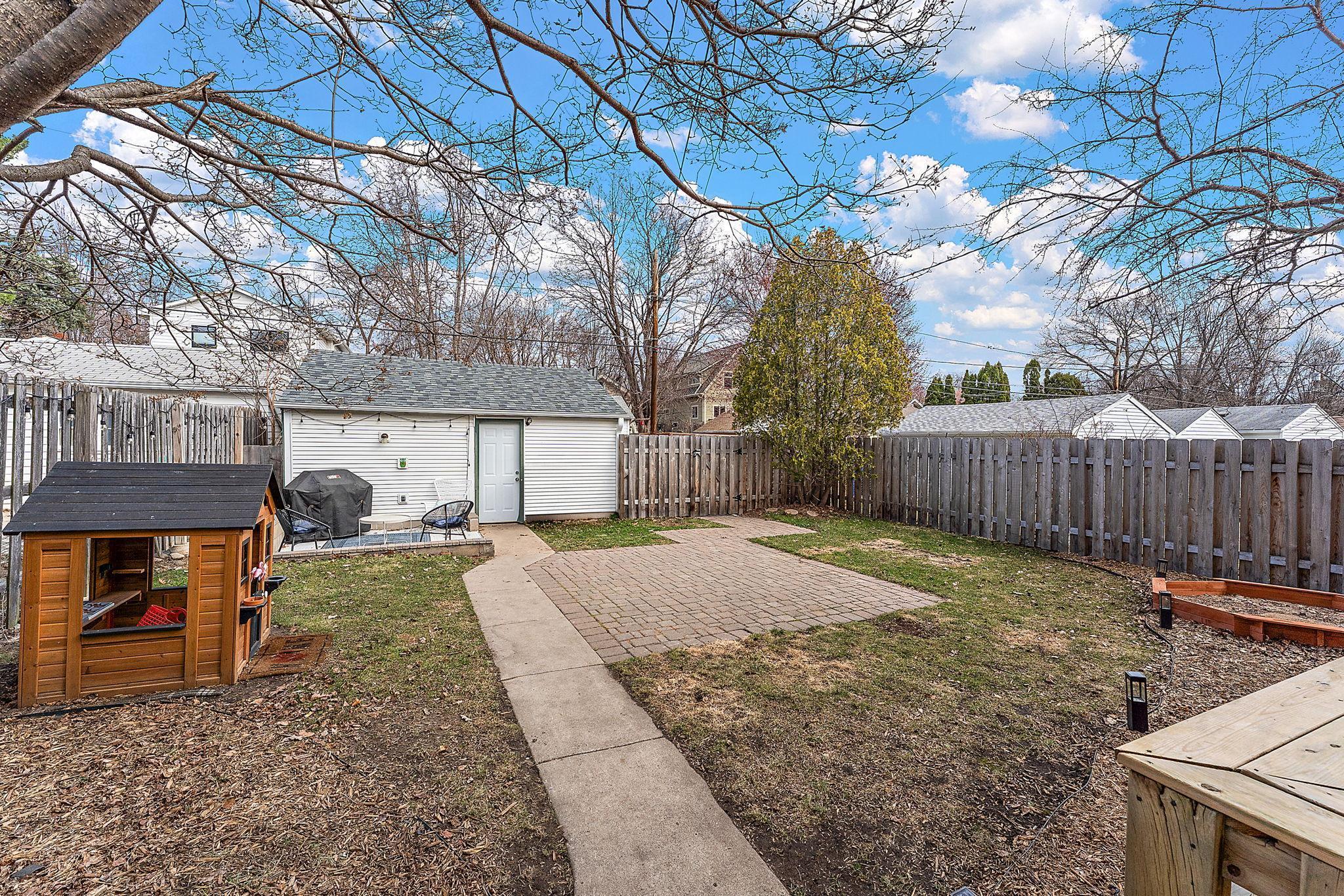 With two patio areas and green space, you’ll be set for grilling with pals, lawn games, or playing fetch with your pup in the fully-fenced yard.