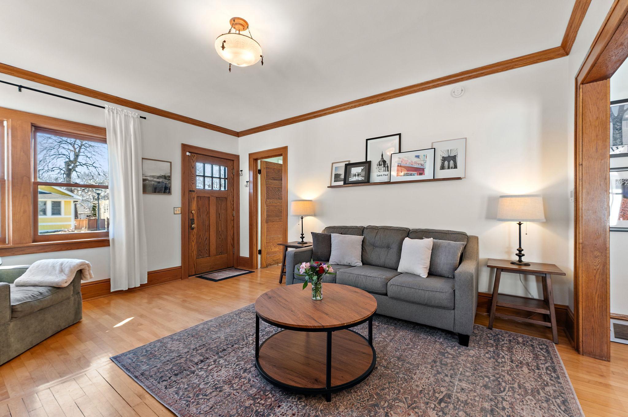 Note the gorgeous, vintage (original?) living room light fixture.