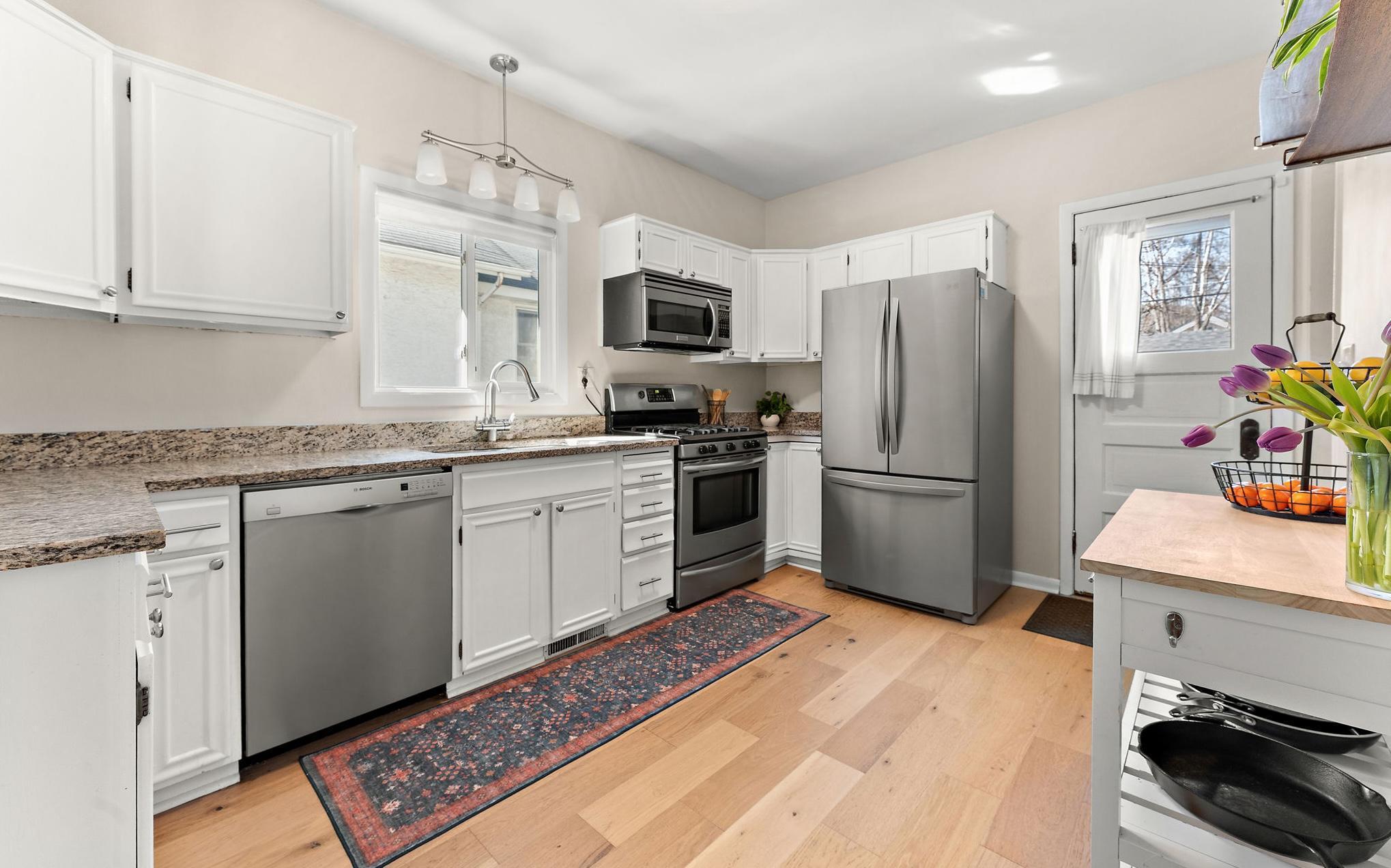 Stainless appliances in the very roomy kitchen.