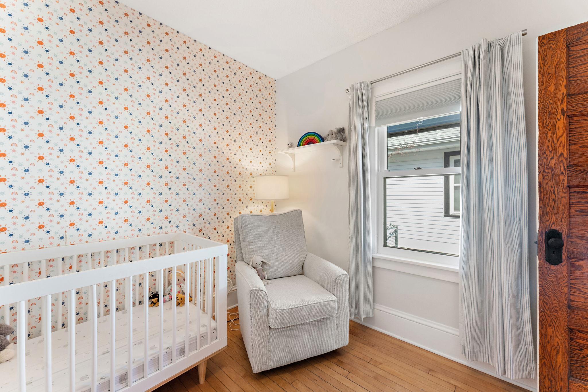 Second main floor bedroom. Perfect for a nursery, home office, guest room, or child's room.