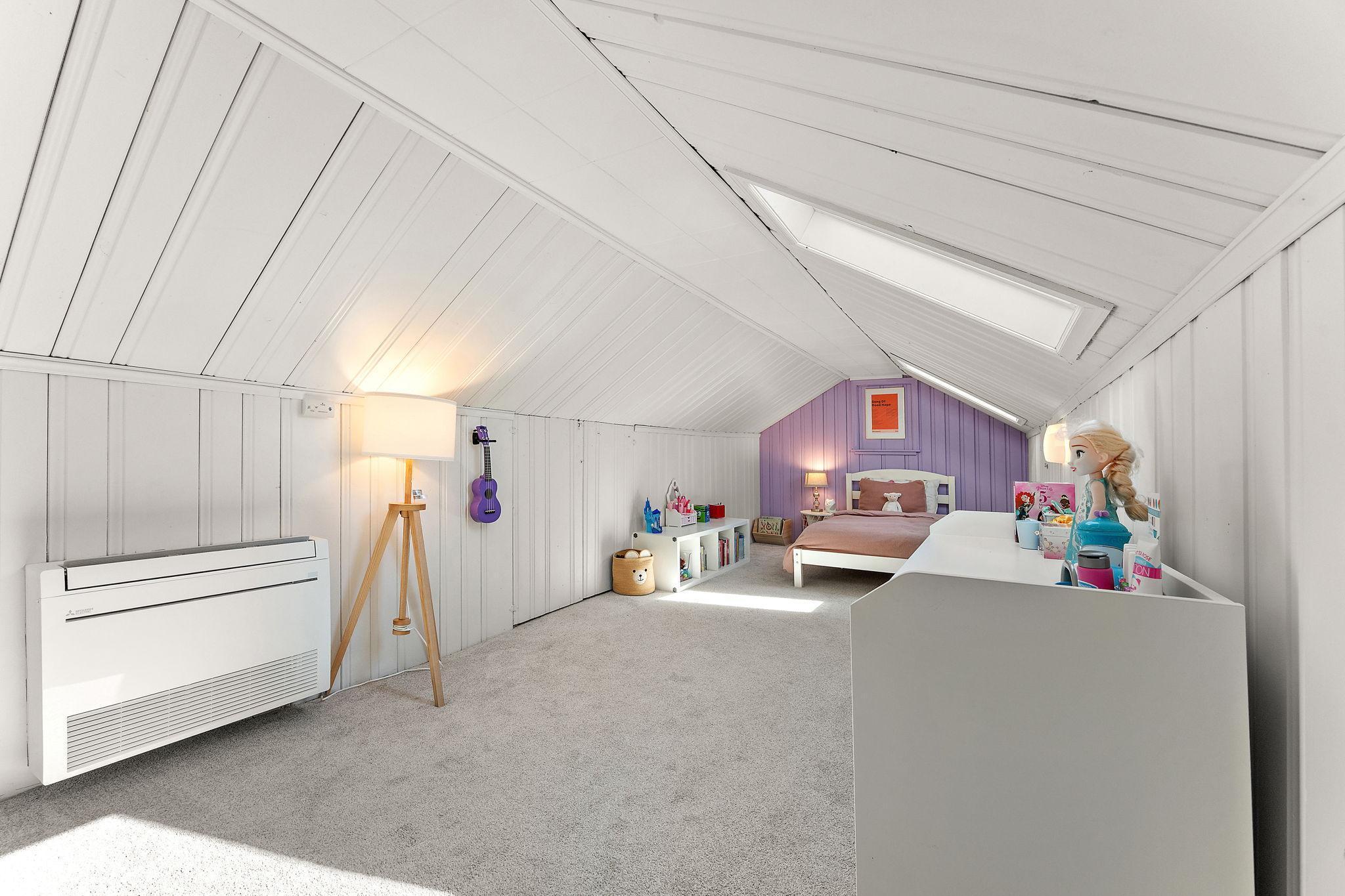 Note the ductless mini-split (2023) on the left — keeps the room as warm or cool as you wish.