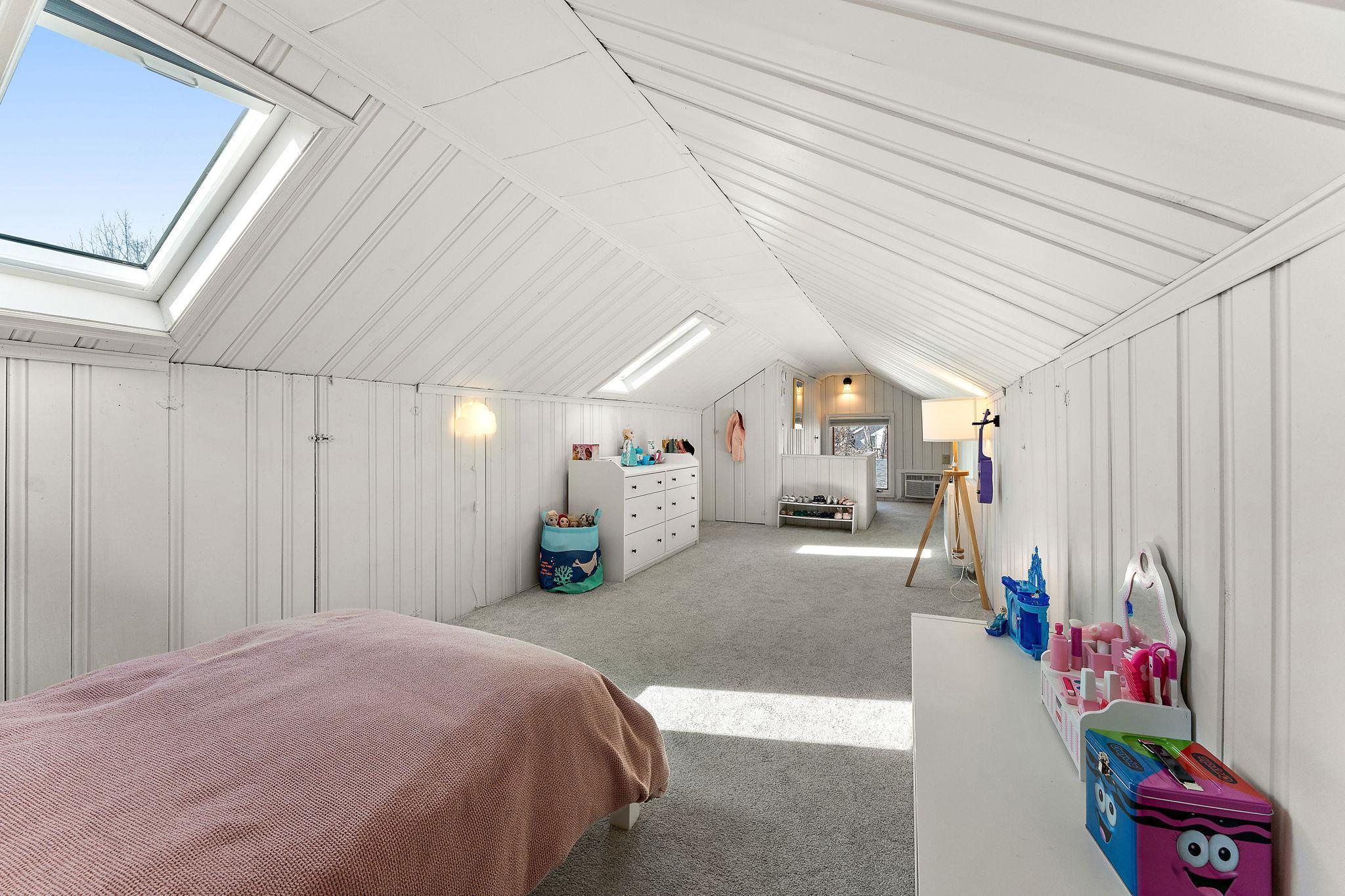 Two skylights add oodles of natural light to the upstairs.