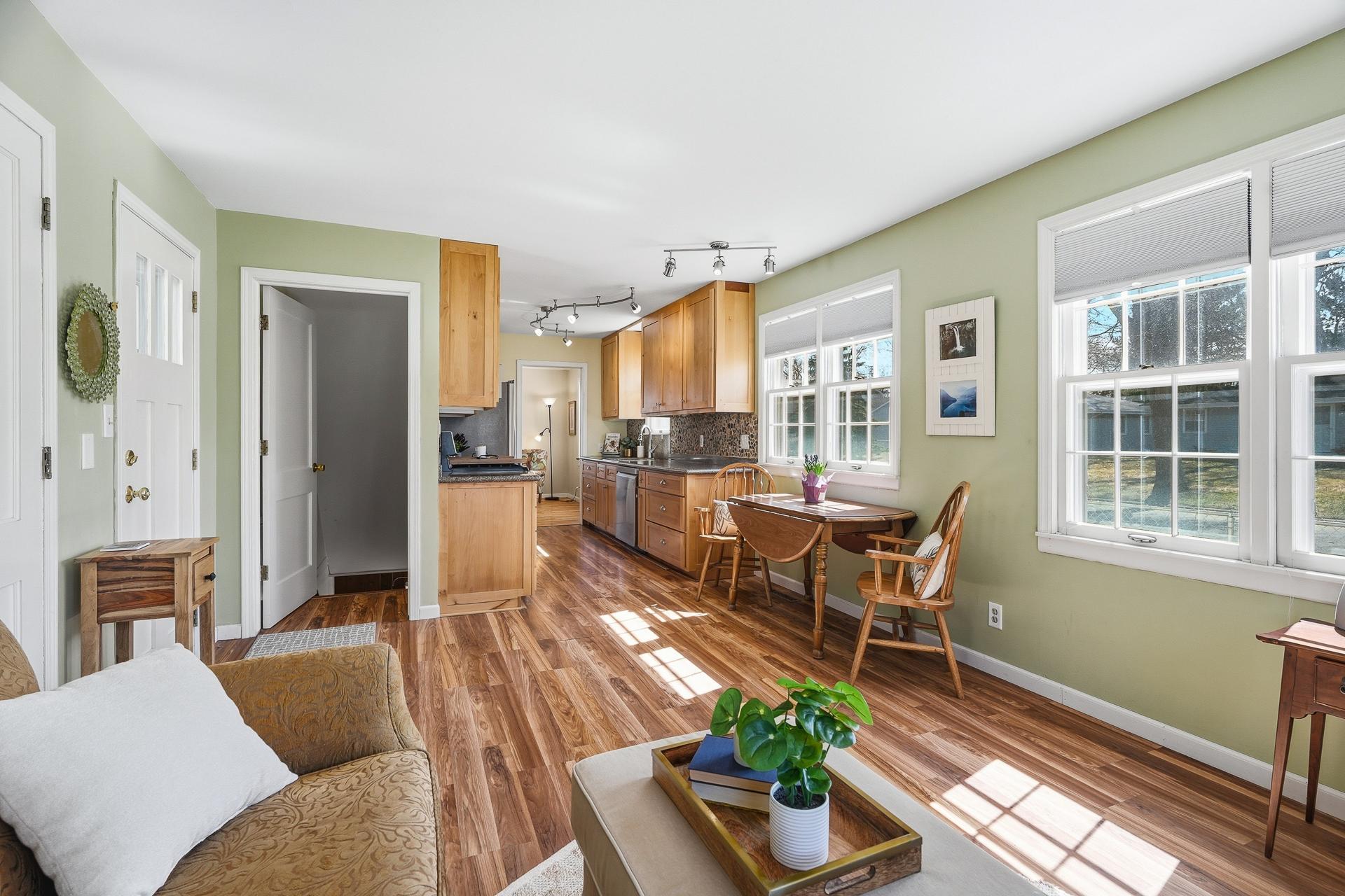 The kitchen opens to a great family room space that feels like a sun room. There is also room for an informal dining area.