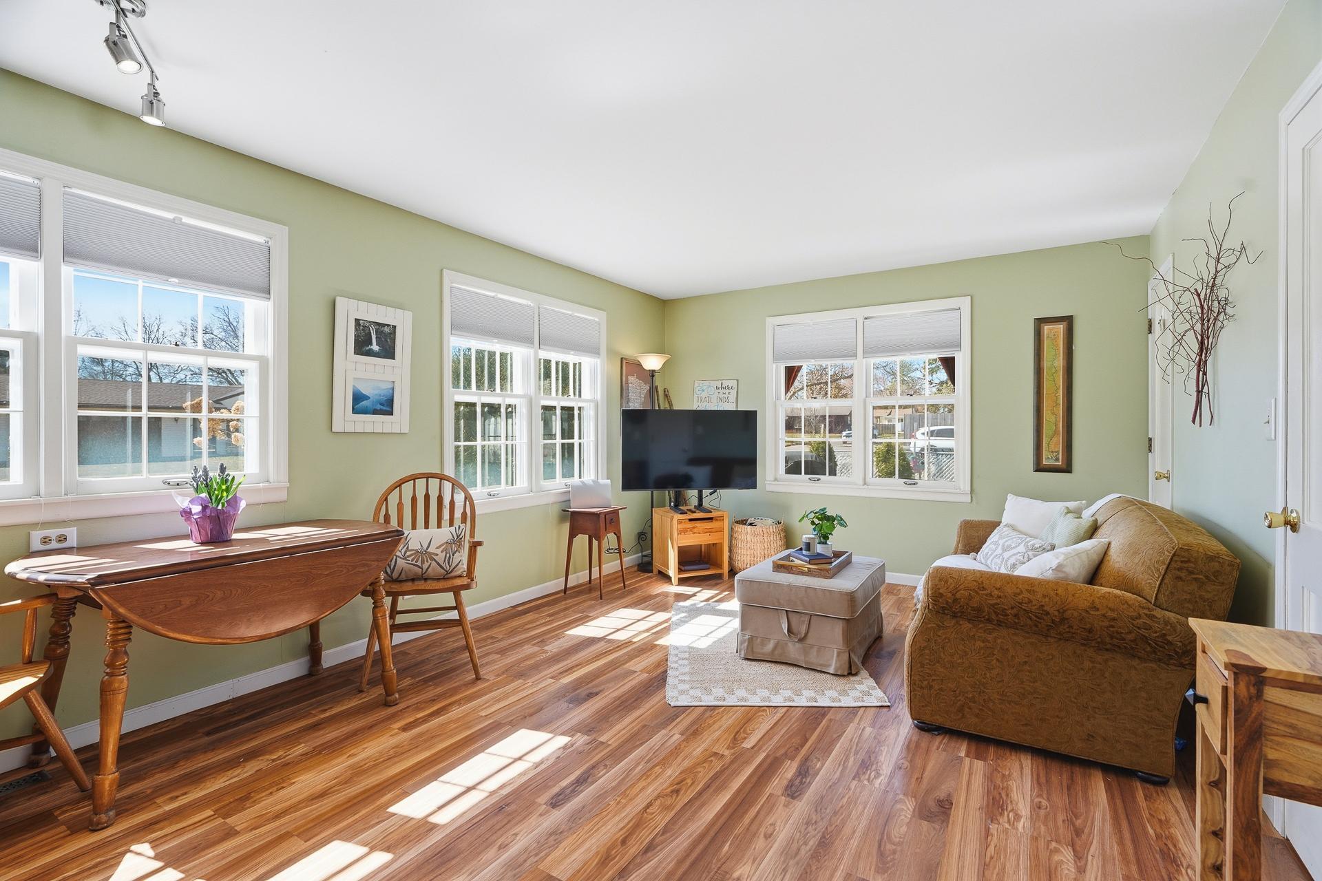 The double hung windows and hardwood floors create such a special room that you are sure to enjoy.