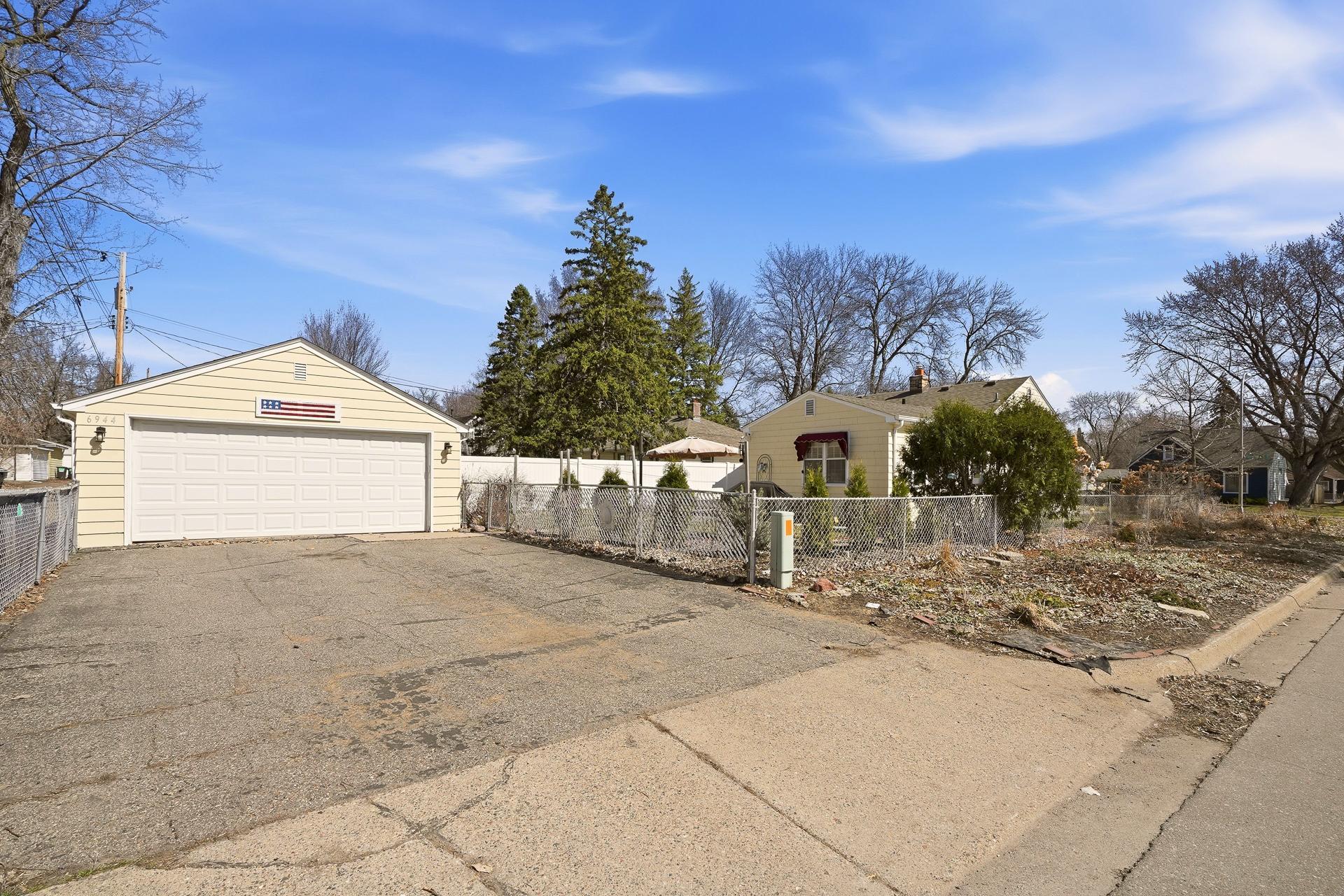 Oversized 20x19.5 Two car garage with large driveway.