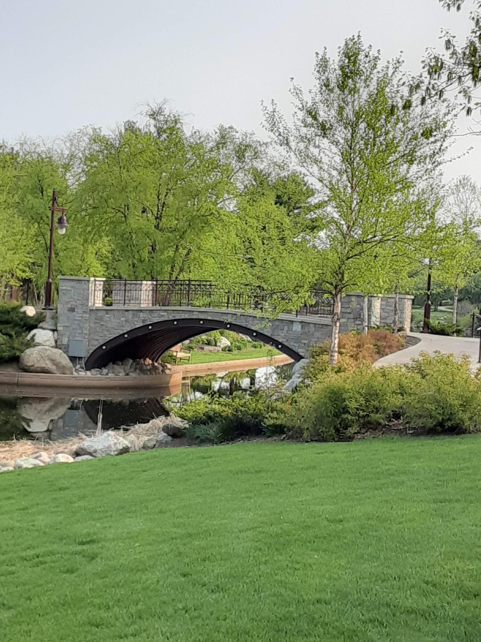 View of bridge at Centennial Lakes nearby. Also, close to Nine Mile Creek access. Many shops, restaurants, parks to enjoy.
