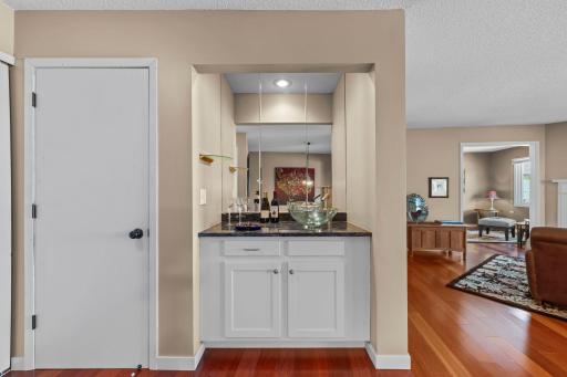 A beautiful wet bar is located just off the dining room.