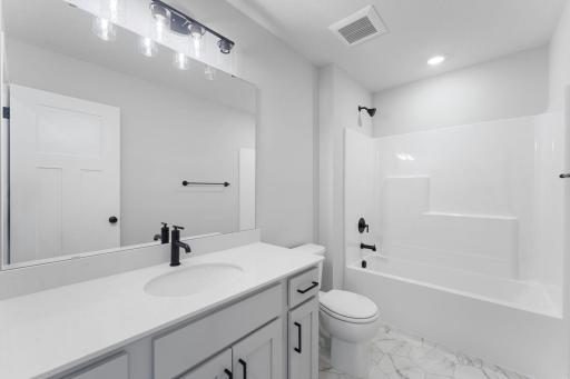 Illustration Only Picture Hall upstairs Bath with easy clean tub/shower surround