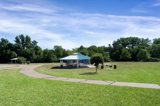 Riverwalk is where dreams are made! Fall in love with the community pool, clubhouse, miles of walking trails, parks, & the Mississippi river just down the street with Cloquet Overlook Park. It's a beautiful blend of city & nature! Slice of Paradise!