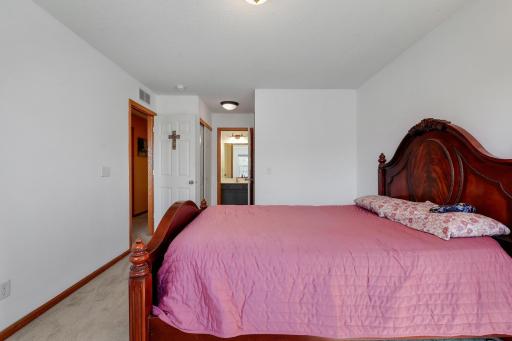 Access to 2 large closets and a walk thru bath.