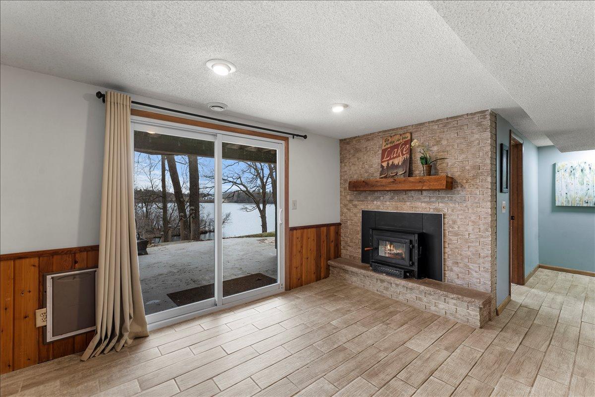 Lower level family room with gas fireplace