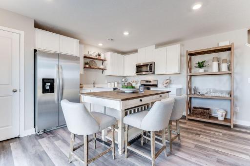 Great for entertaining, welcome your guests in style. Photo of model home, color & options will vary.
