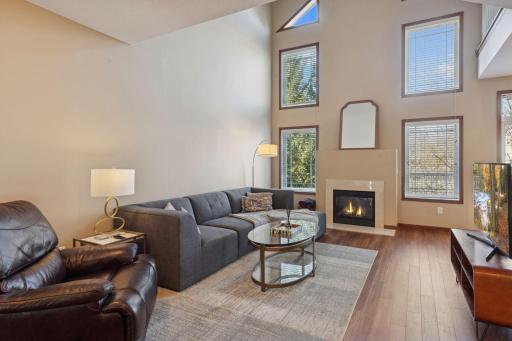 The large transom windows above the fireplace bring in an abundance of natural lighting