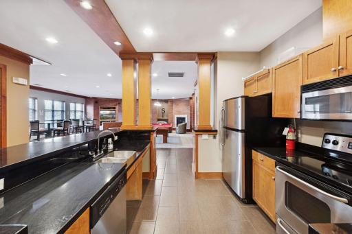 Community room kitchen for hosting gatherings and parties