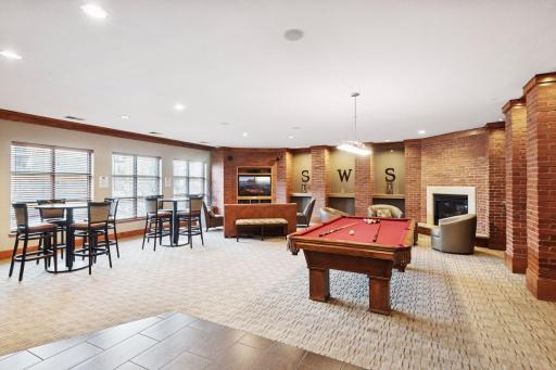Community room with pool table for resident use