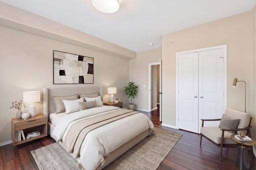 Spacious primary suite with double closet, hardwood-style floors. This one sleeps well. *virtually staged for inspiration