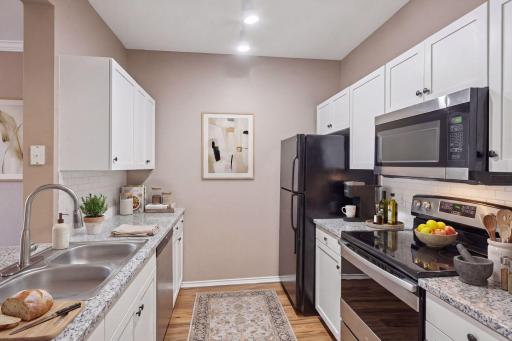 Fresh white cabinets, new backsplash, granite counters & stainless appliances â this kitchen works. *virtually staged for inspiration!