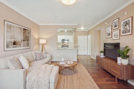 Open-concept flow from living room to kitchen â ideal for entertaining without losing your guests. *Virtually staged for inspiration