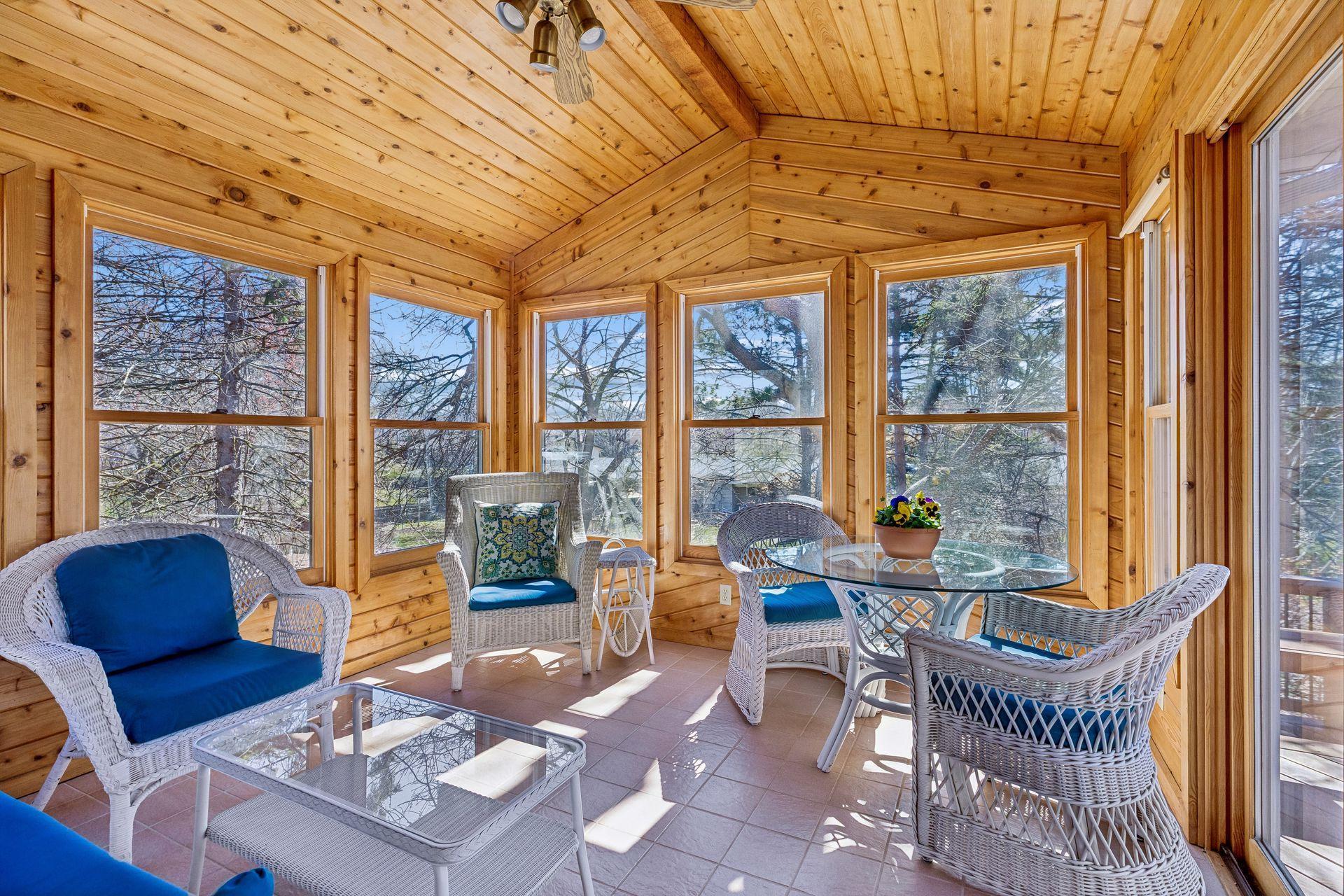 Charming 3 season porch located off Family room