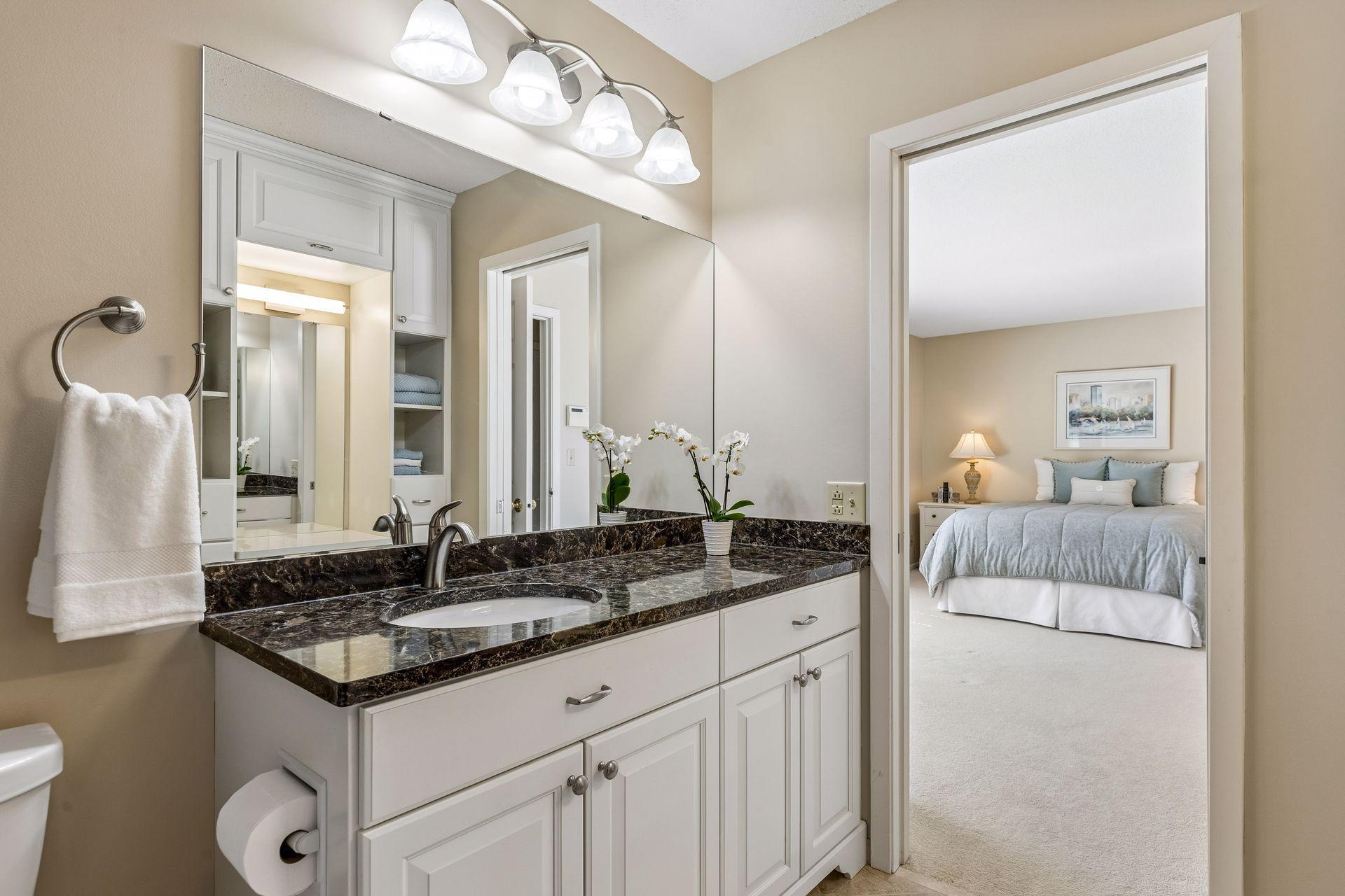 Upper level full bath also features access to owners bedroom