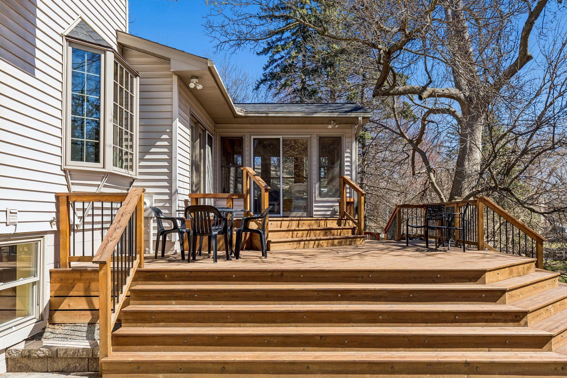Large tiered deck off porch makes a summertime gathering a must!