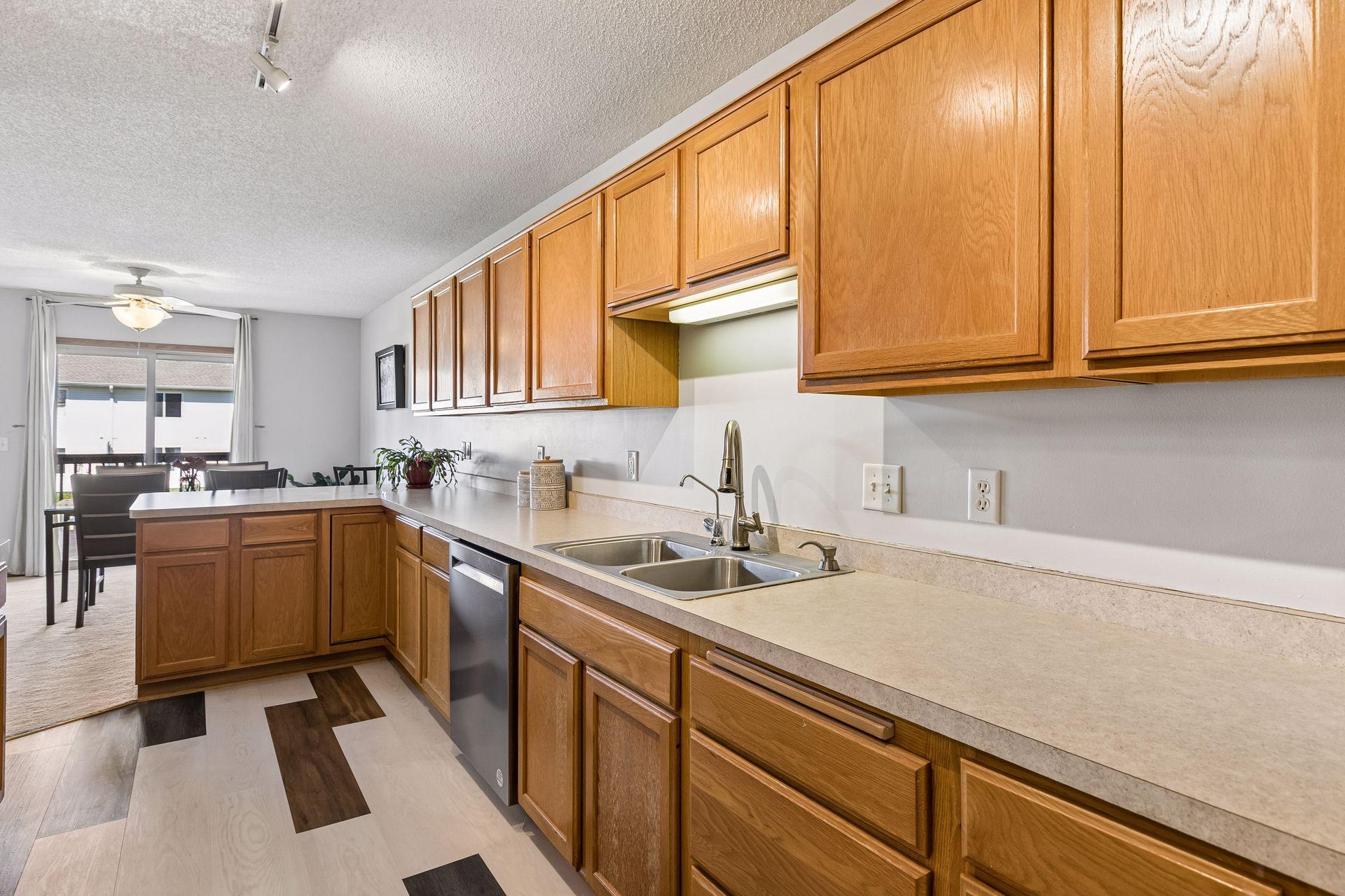Generous cabinetry ensures plenty of storage throughout the kitchen.