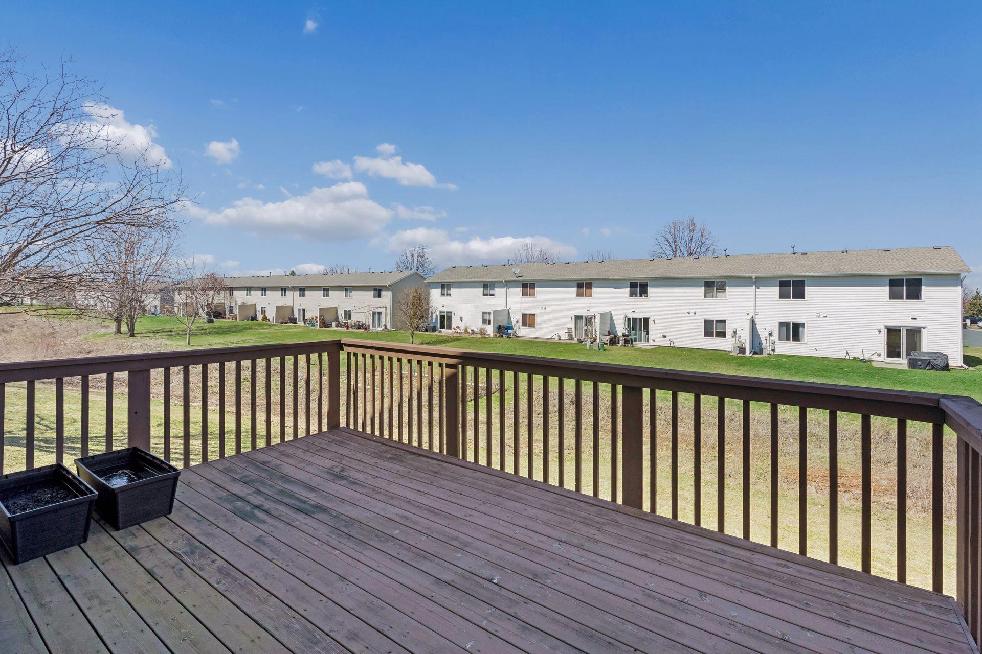 Relax or entertain on the large deck overlooking green space!