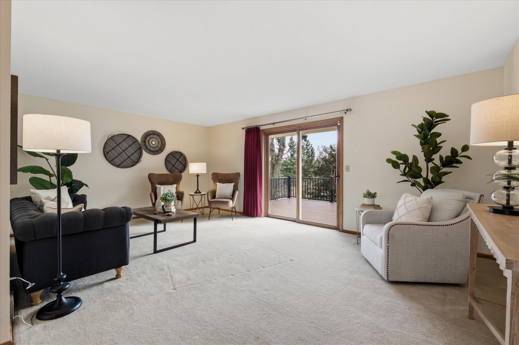 Main floor living room opens to deck