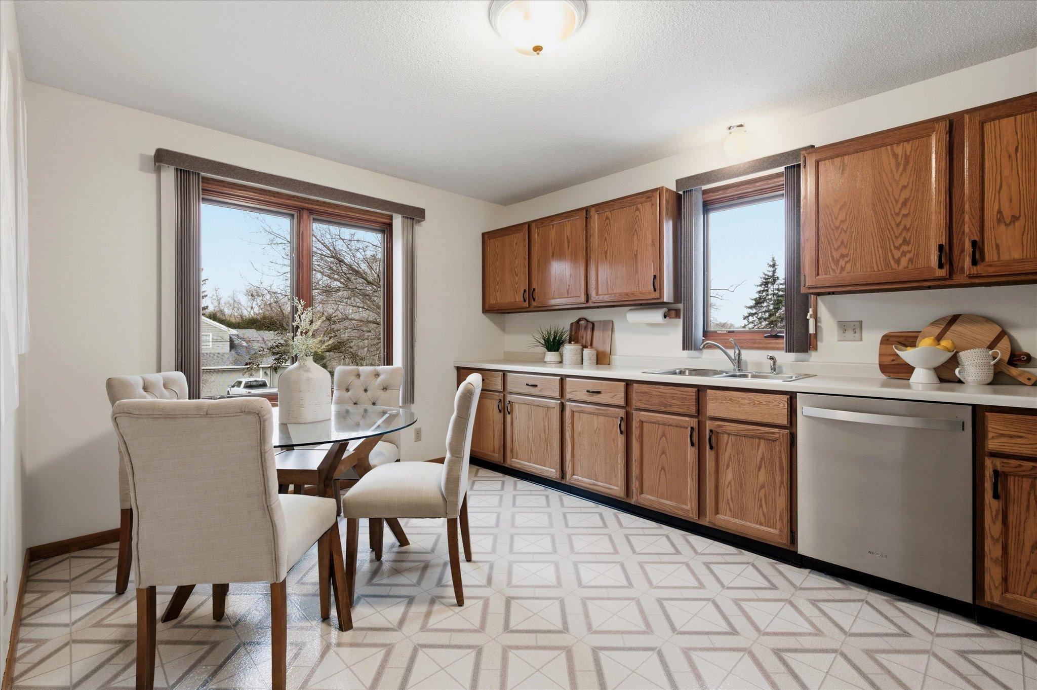 Eat-in Kitchen with a window over the sink overlooking the side yard.