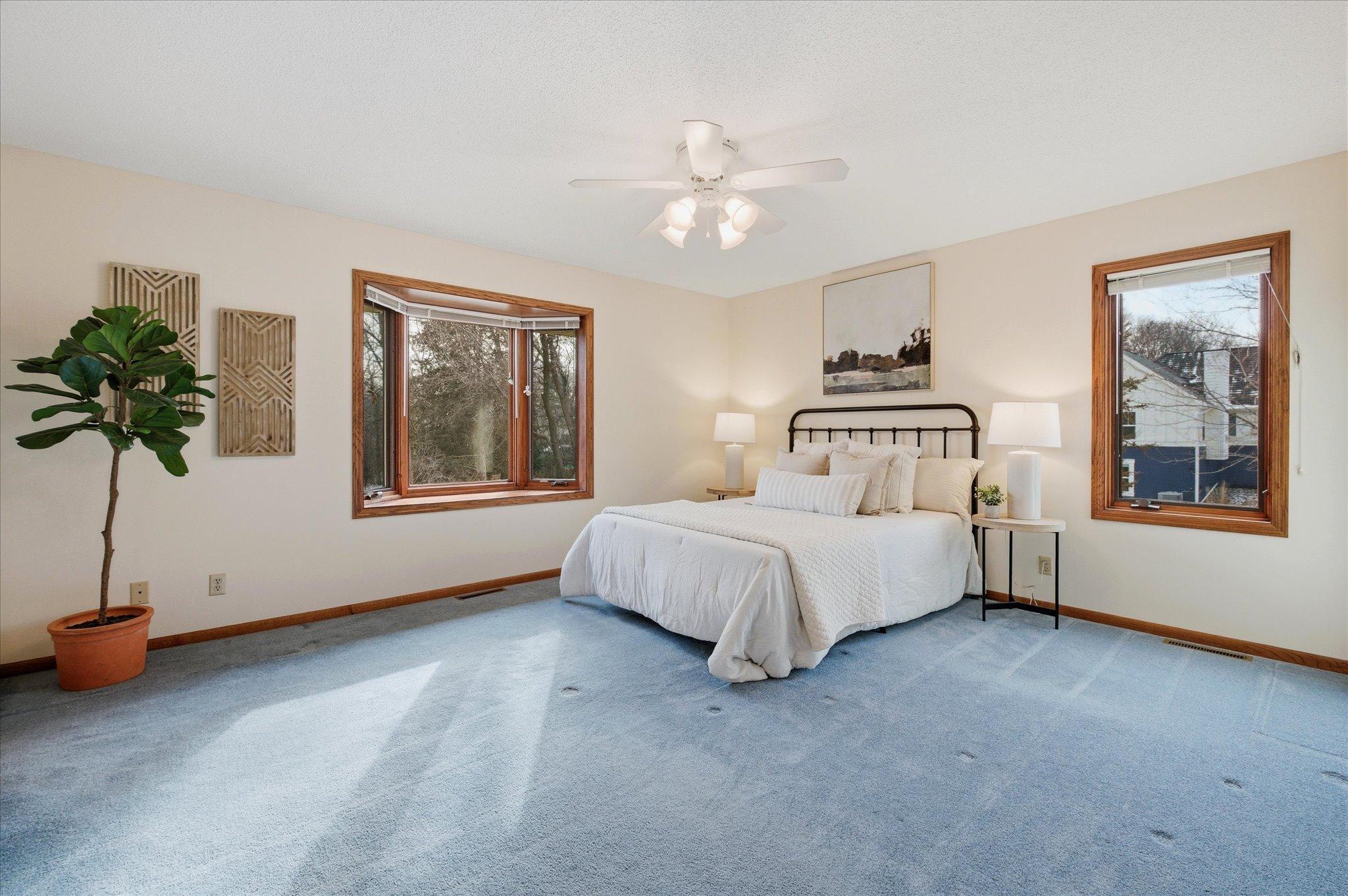 Owner's bedroom suite with a bay window