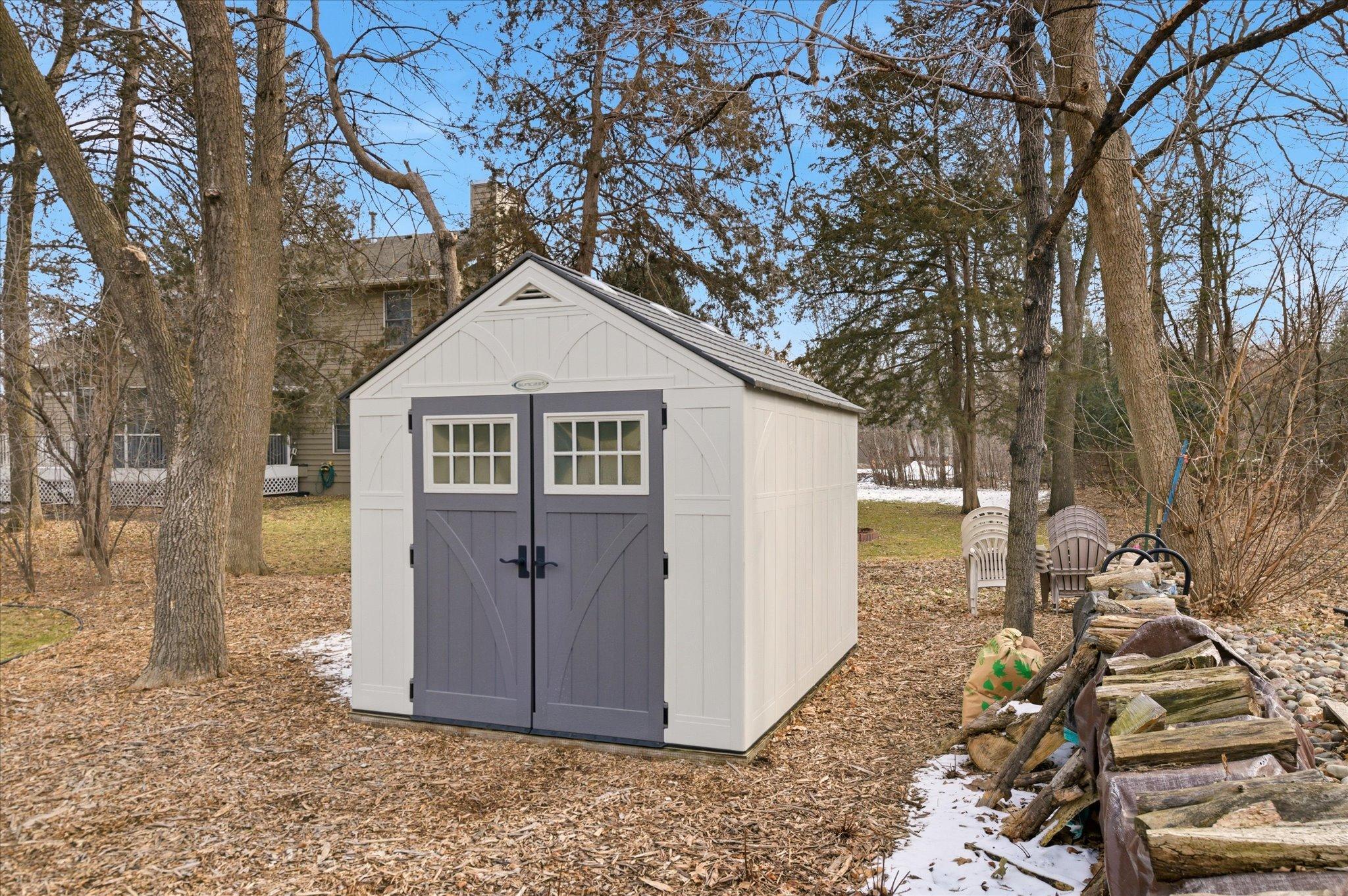 Handy storage shed and firewood