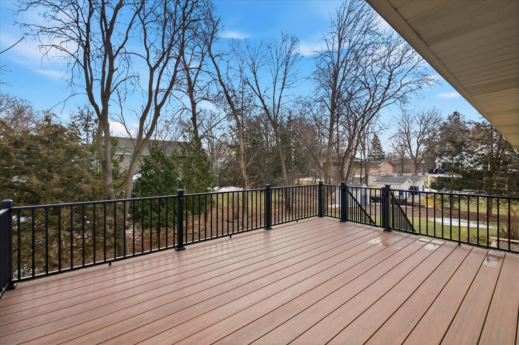 Maintenance-free deck has lights controlled by a remote.