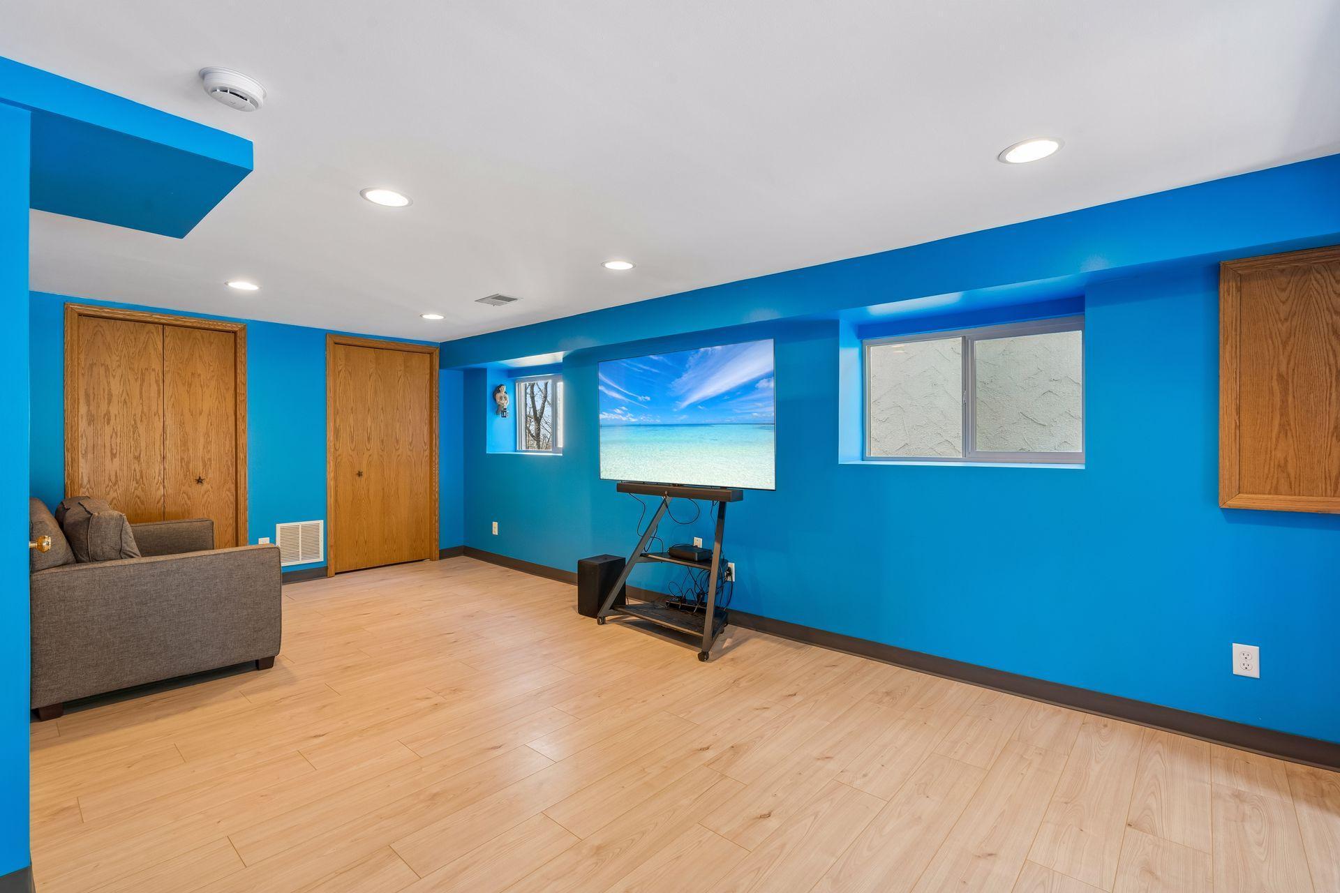 Lower level family room - completely remodeled in 2024 from top to bottom.