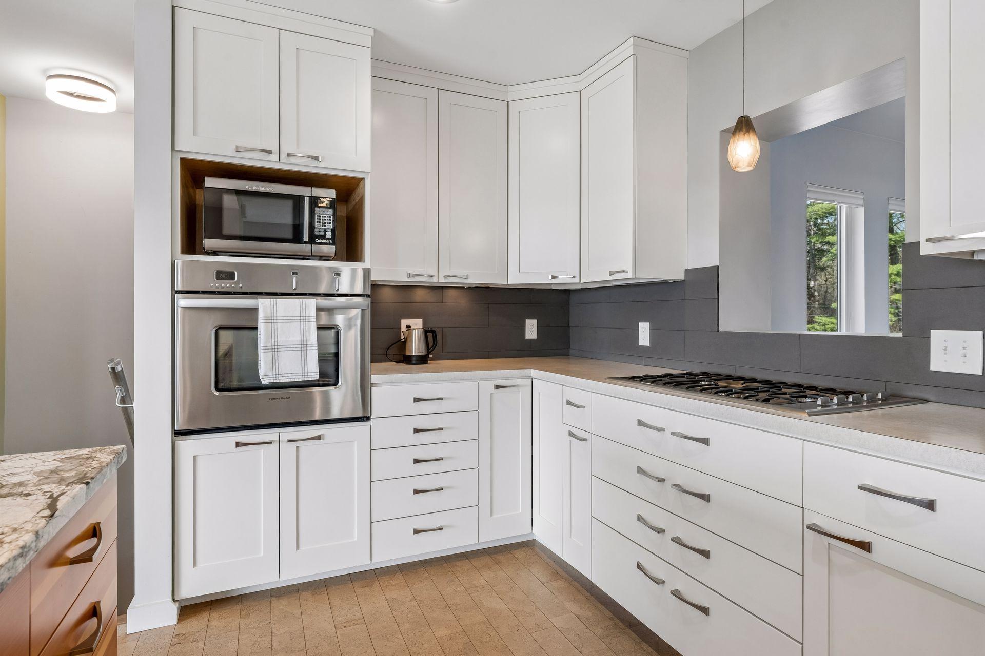 Cabinetry: Solid birch drawers front and sides, ¾” plywood drawer bottoms and shelves.
