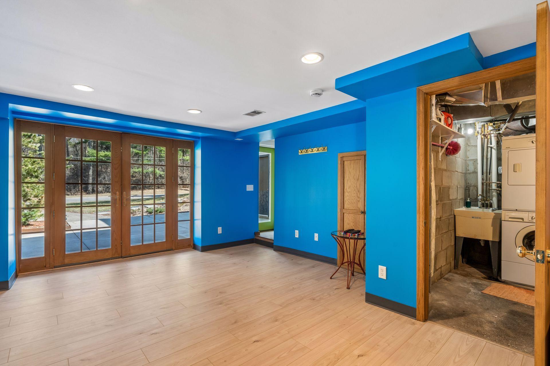 Adjacent laundry with stackable washer/dryer.