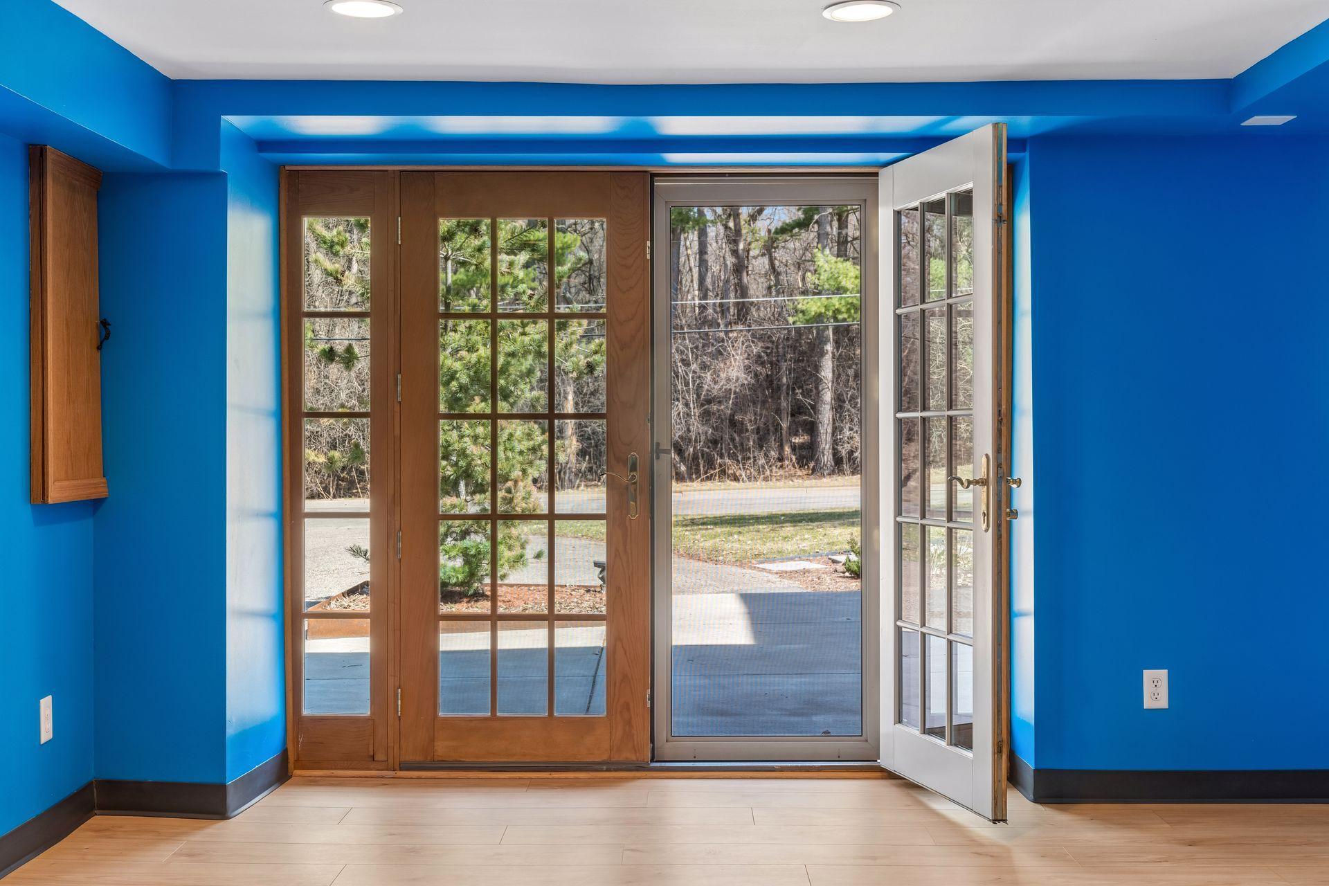 French doors walkout to the front patio - perfect for a summer breeze.