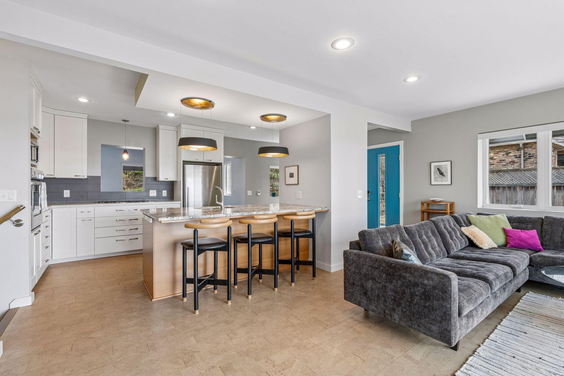 Warm and welcoming open floor plan. The space was completely renovated top to bottom and included a professionally designed custom kitchen.