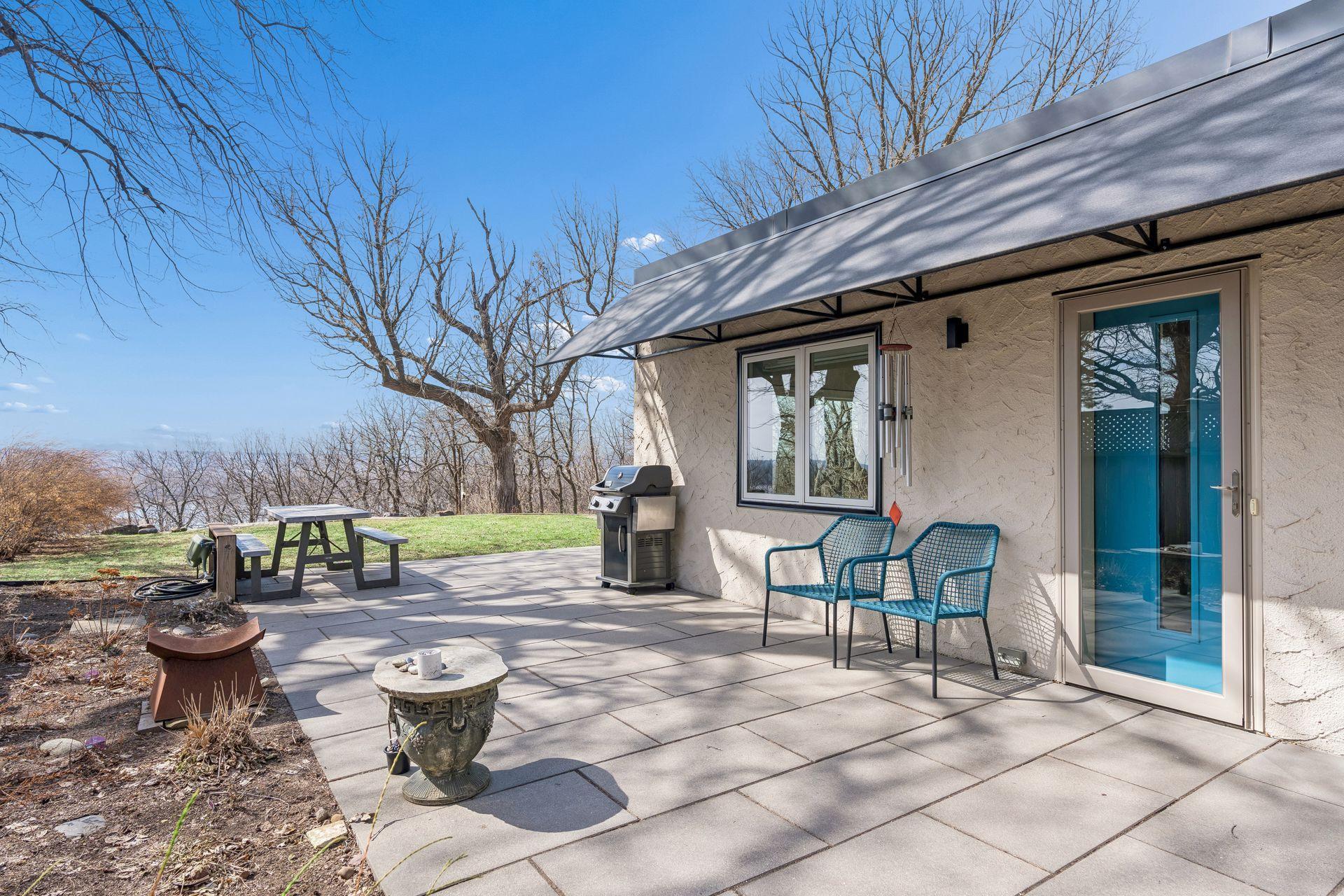 Side patio off the kitchen walks out to the garden.