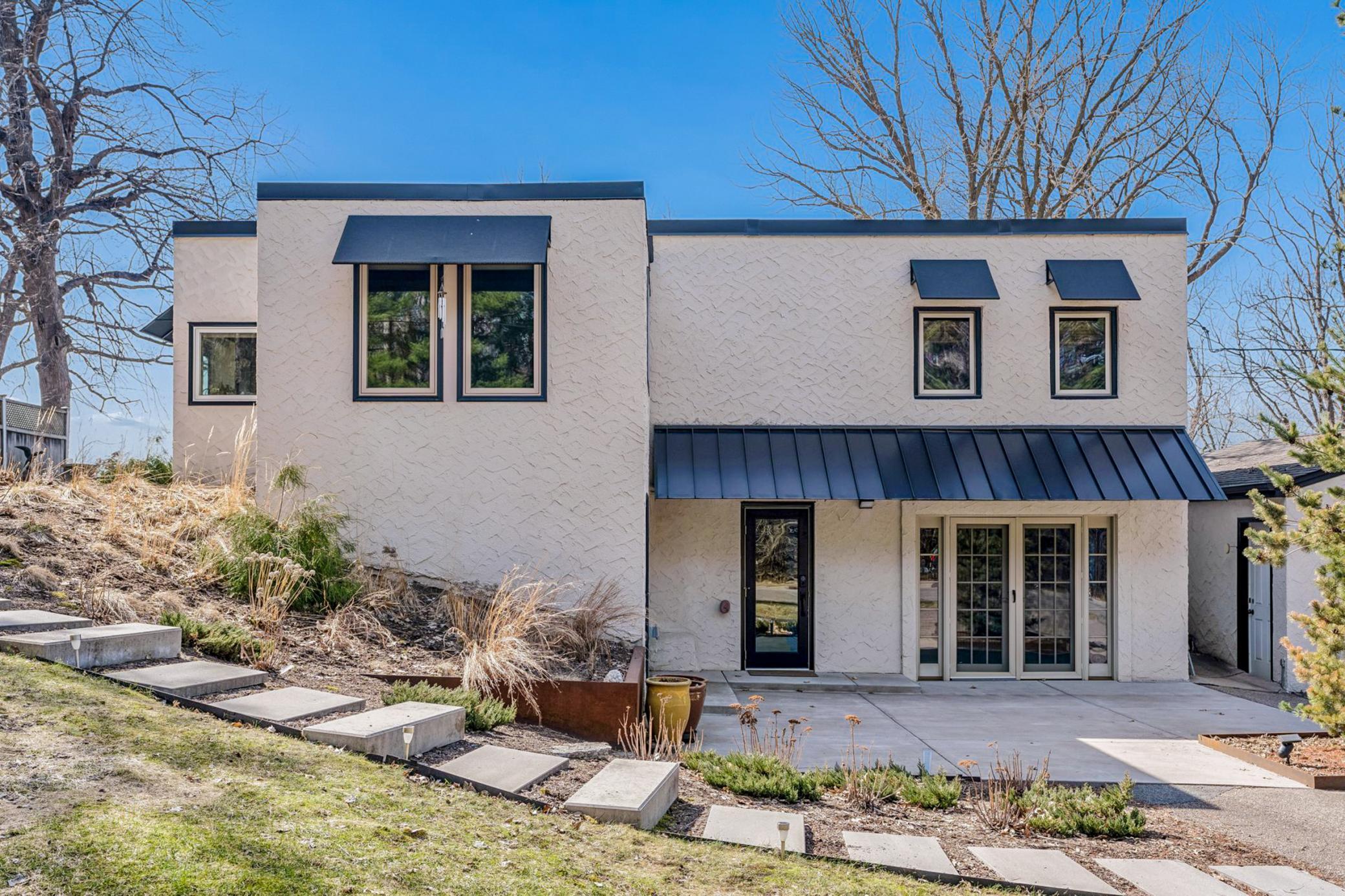 The home was built for low maintenance (stucco exterior), energy efficiency, and durability. All exterior walls and one inside wall (basement) consist of a double row of cinderblock concrete walls and solid concrete floors and ceilings.