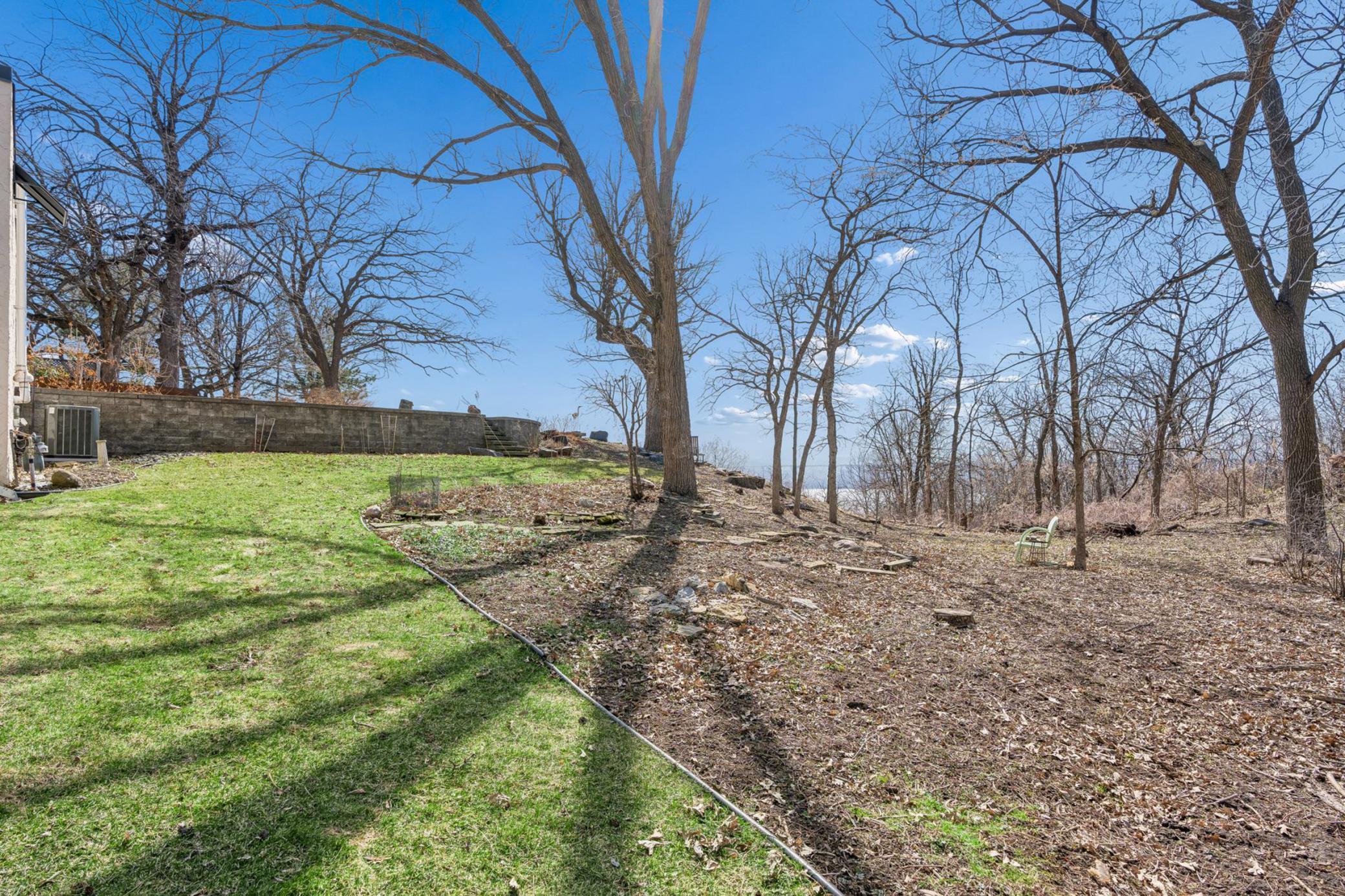 Side yard offers possibilities for additional vegetable and perennial gardens.