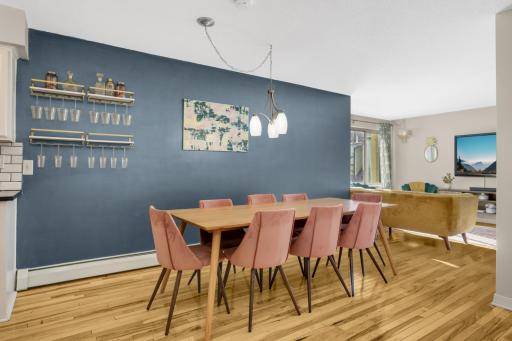 Who doesn't love a wall mounted bar cart for libations and entertaining, not to mention the space for an easy flow for a plus 8! Host dinner, craft, games, a pre-game bevy, HH!